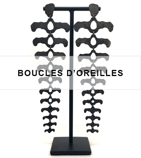 vers les boucles d'oreilles de la boutique